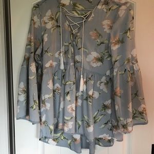 Beautiful light blue and floral bell sleeved top